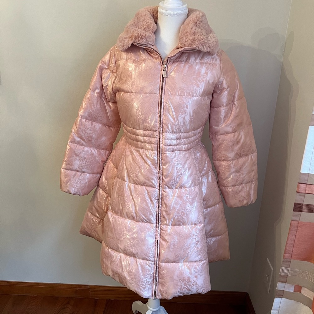 Brand new coat puffer for girl.  No tags. Designed in Spain Size 14.  153 cm